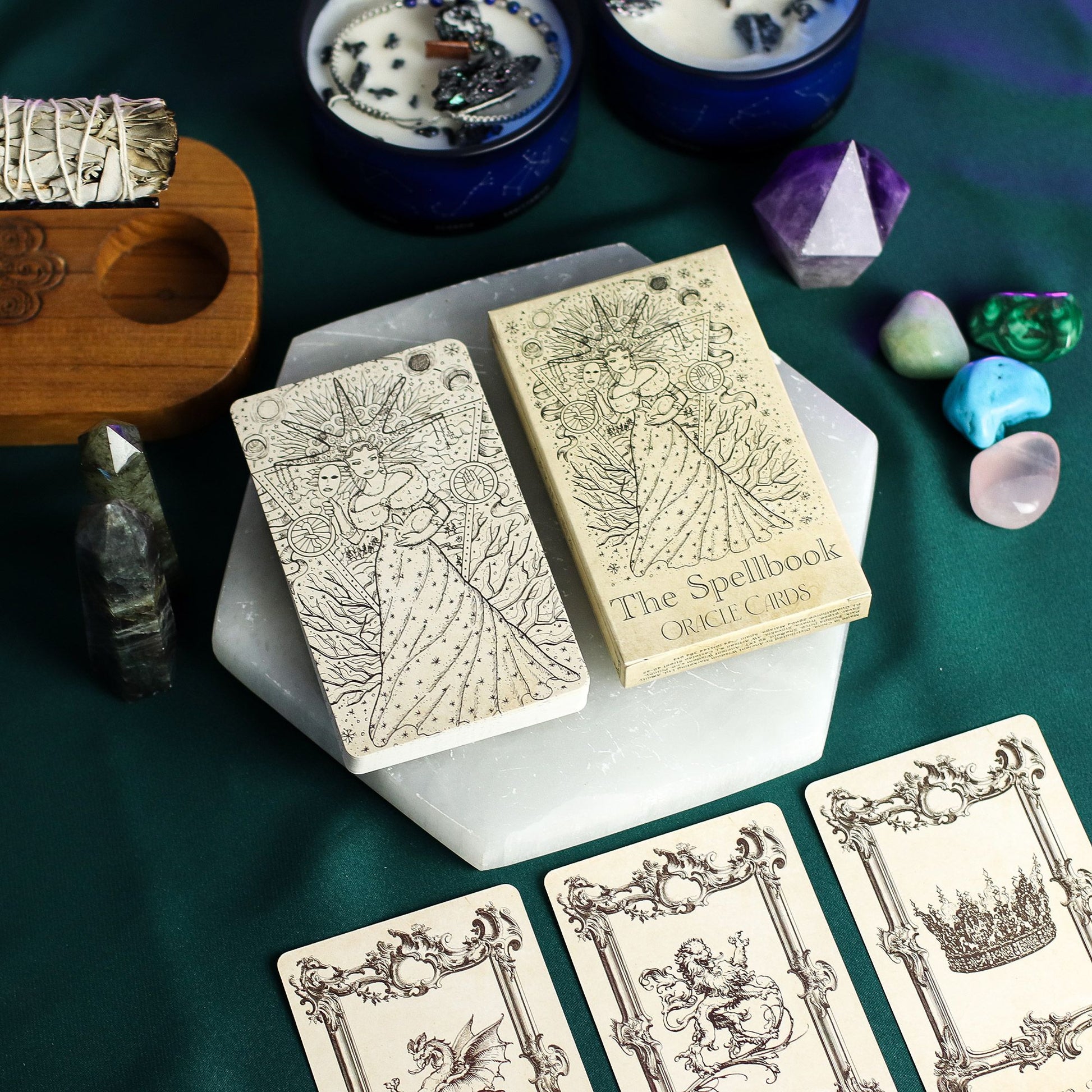 Spellbook style witchcraft oracle deck with forty illustrated monochrome cards and matching illustrated box.