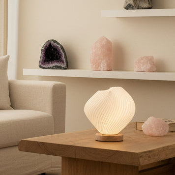 Shell twisted New Wave Lamp with textured surface and soft ambient glow