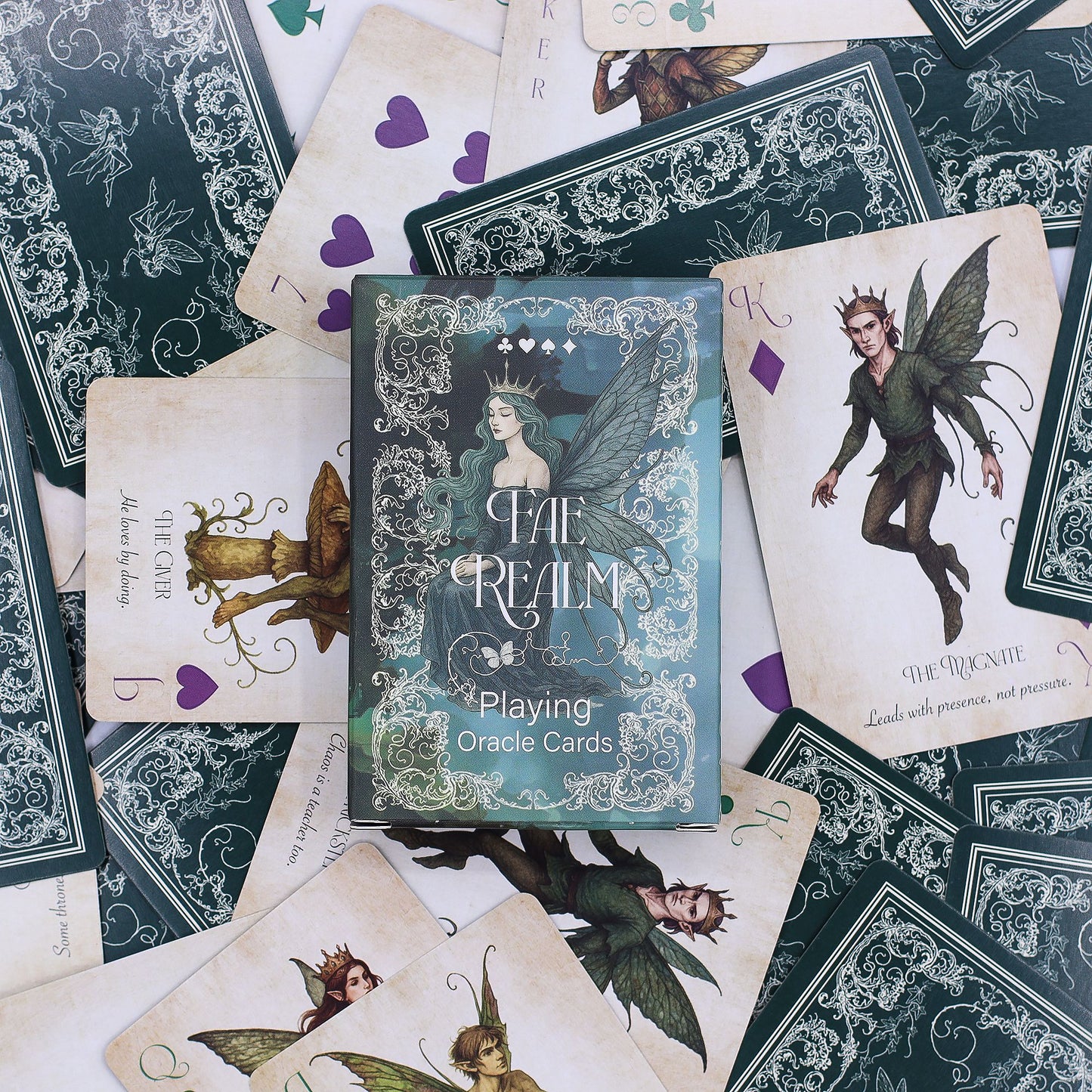 Fairy themed 54 card oracle and playing card deck with ethereal artwork and matching illustrated box.