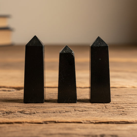 Black Tourmaline crystal obelisk tower for grounding and protection energy in meditation spaces