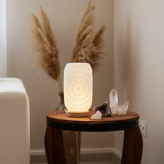 Twisted sculptural USB lamp on wooden base designed for calm interiors